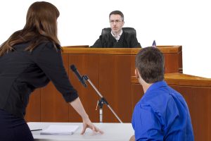 Public defender defending client